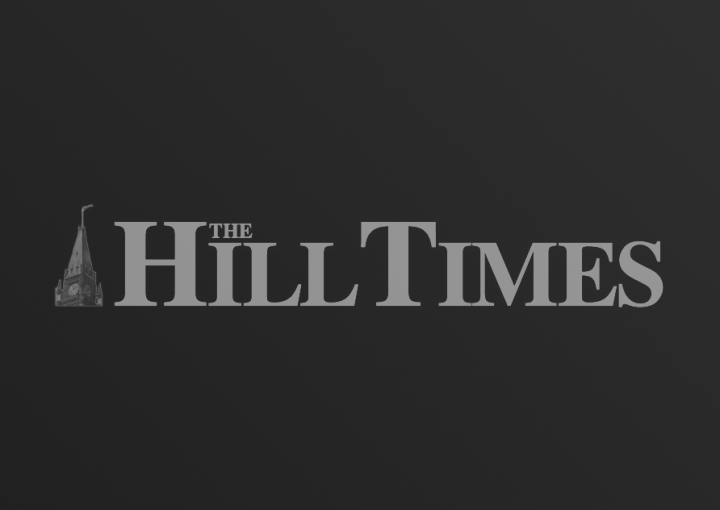 The Hill Times logo on dark gradient background