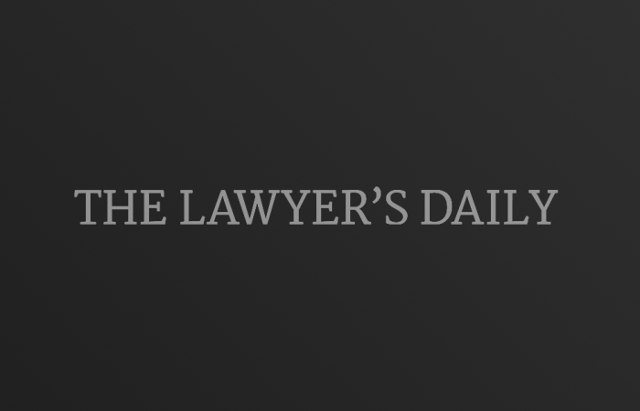 The Lawyer's Daily logo on dark gradient background